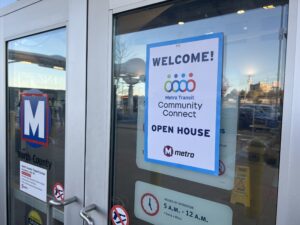 Community Connect sign on a transit center door