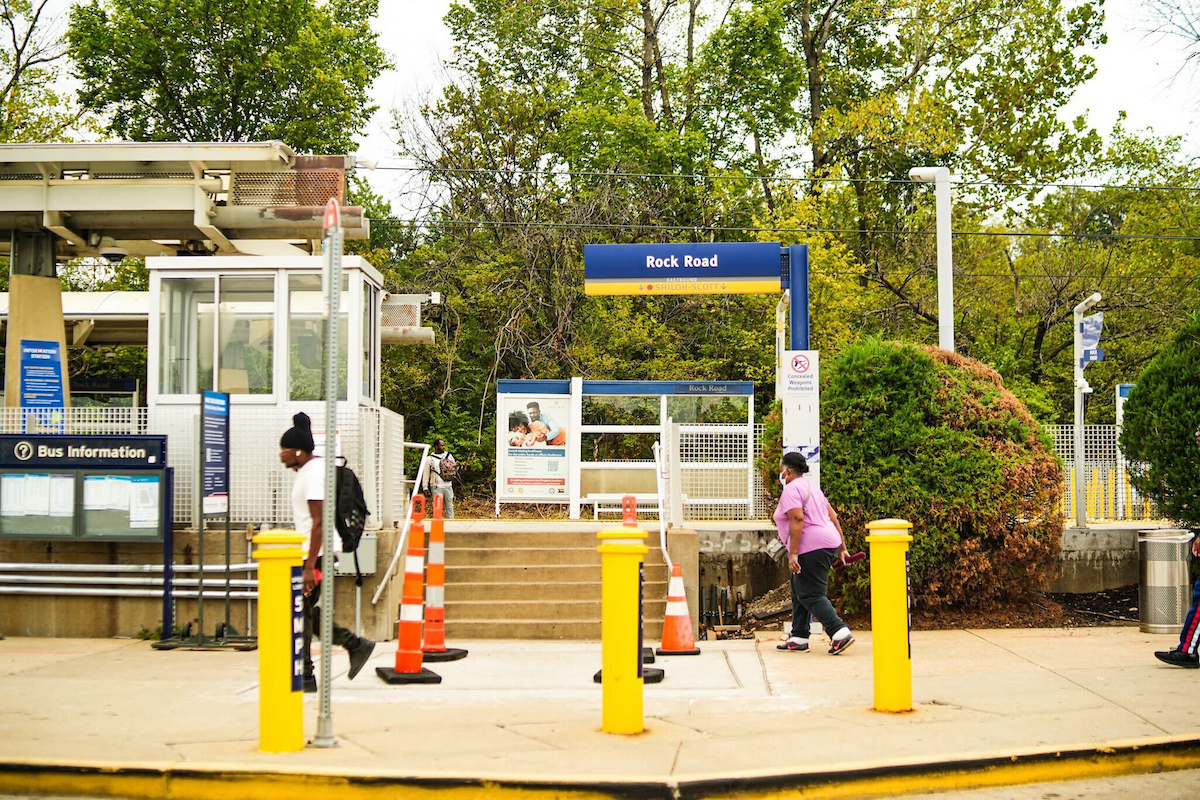 MetroLink riders walk along the Rock Road Station.